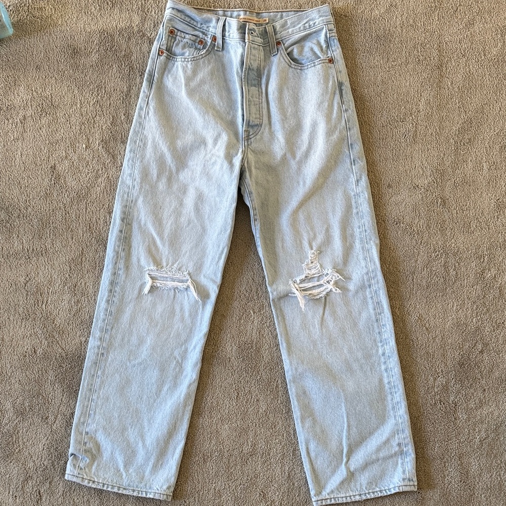Levi’s Premium 501 Light Blue Distressed Jeans